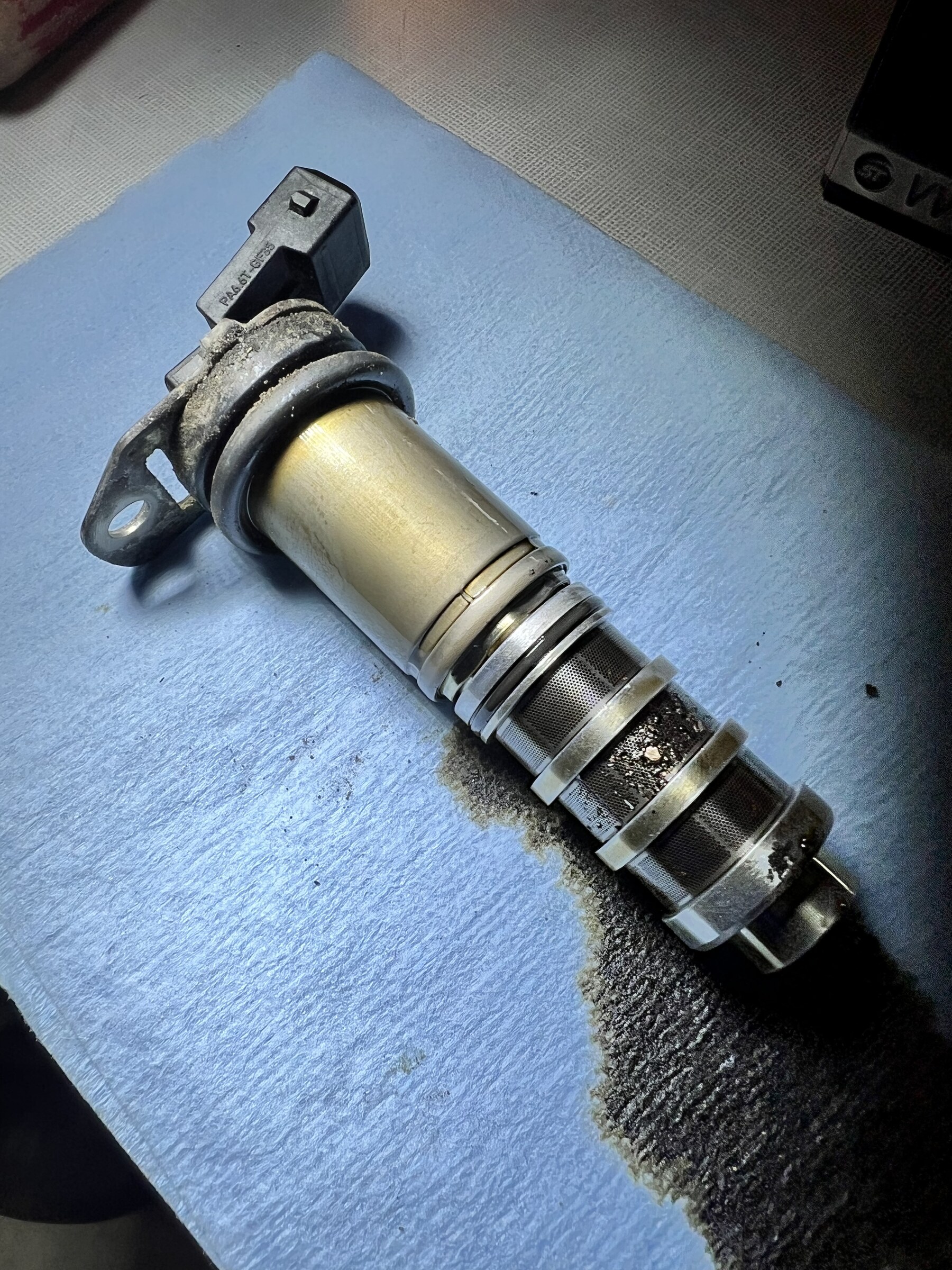 E92 N55 VANOS solenoid on a shop rag