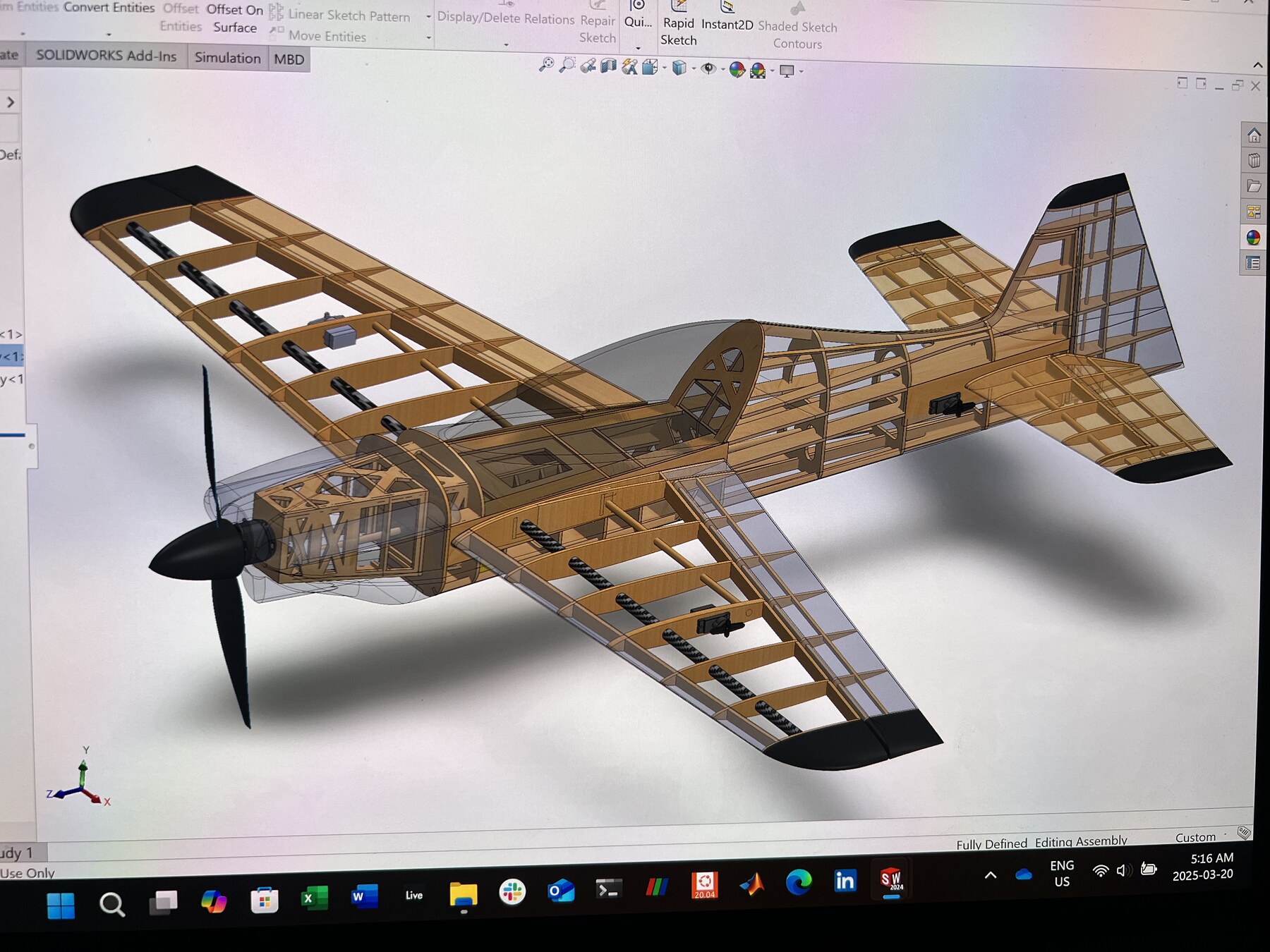 The SBach 342 internal structure complete in CAD: full rib stack, spars and formers, skin hidden.