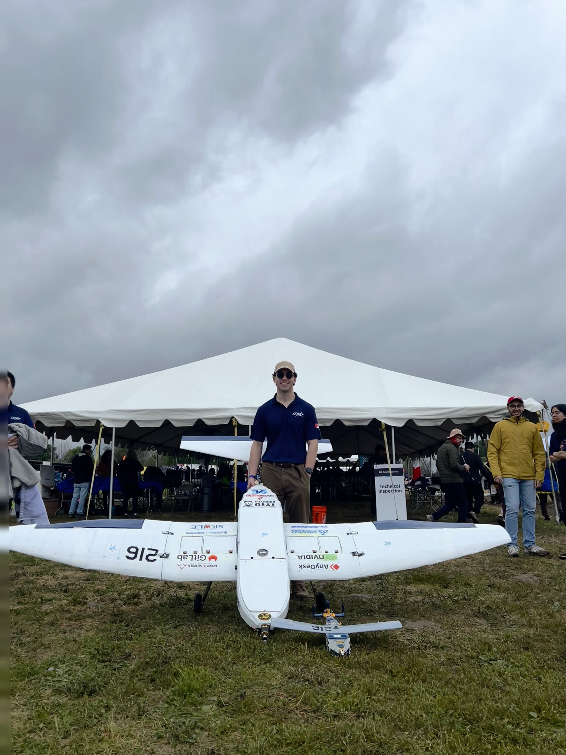 Mason with the Minerva competition airframe at SAE Aero Design West 2024