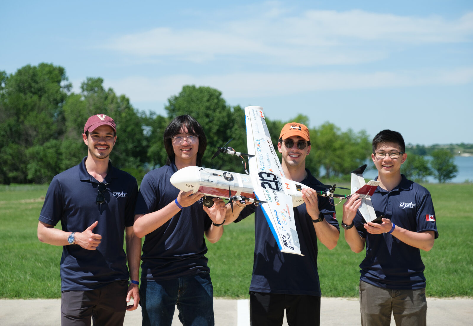 UTAT Aero team beside an Ontario lake