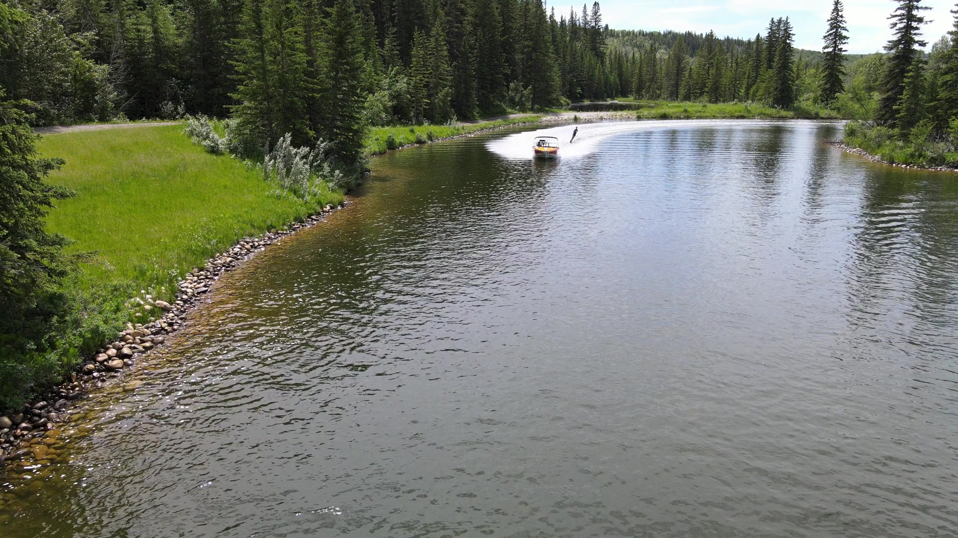 Low aerial of a skier in a canal